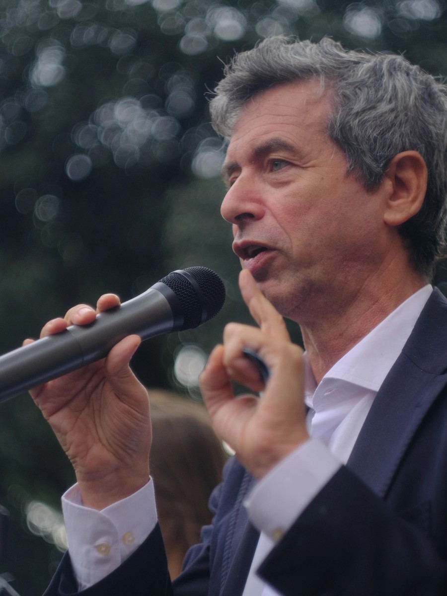 Andrea Orlando speaking into a microphone