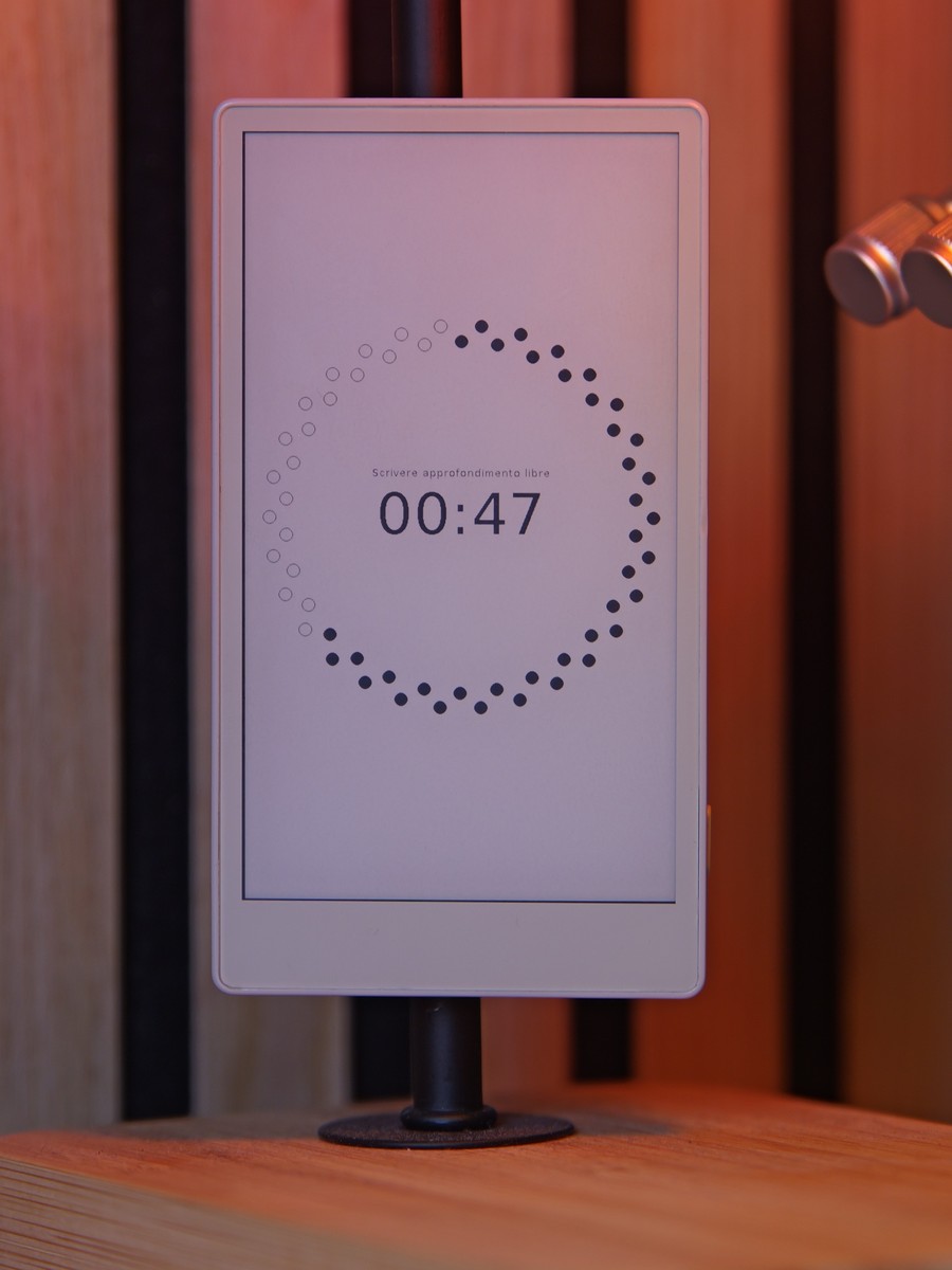 An e-ink device on a wooden stand